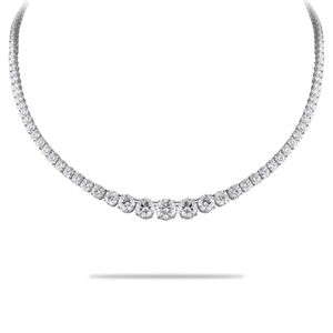 Rivière, taille brillant, 1,40 carat au centre, en or blanc par George Hakim