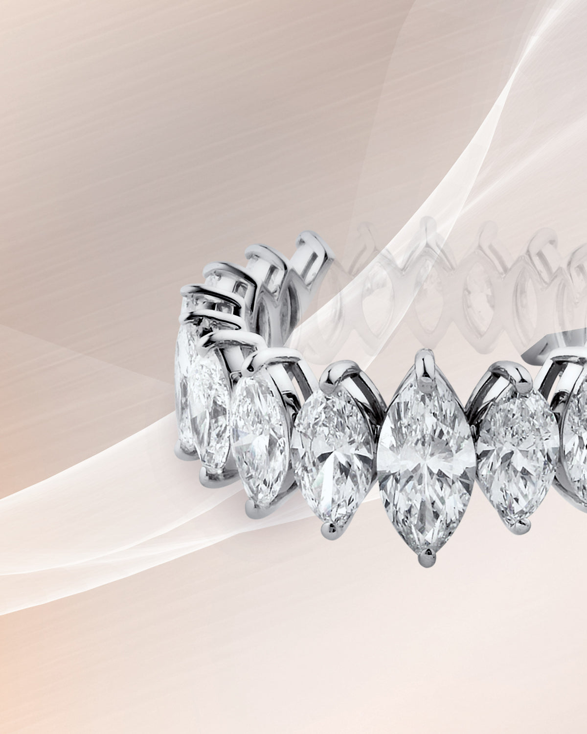 A diamond band on blush silk.