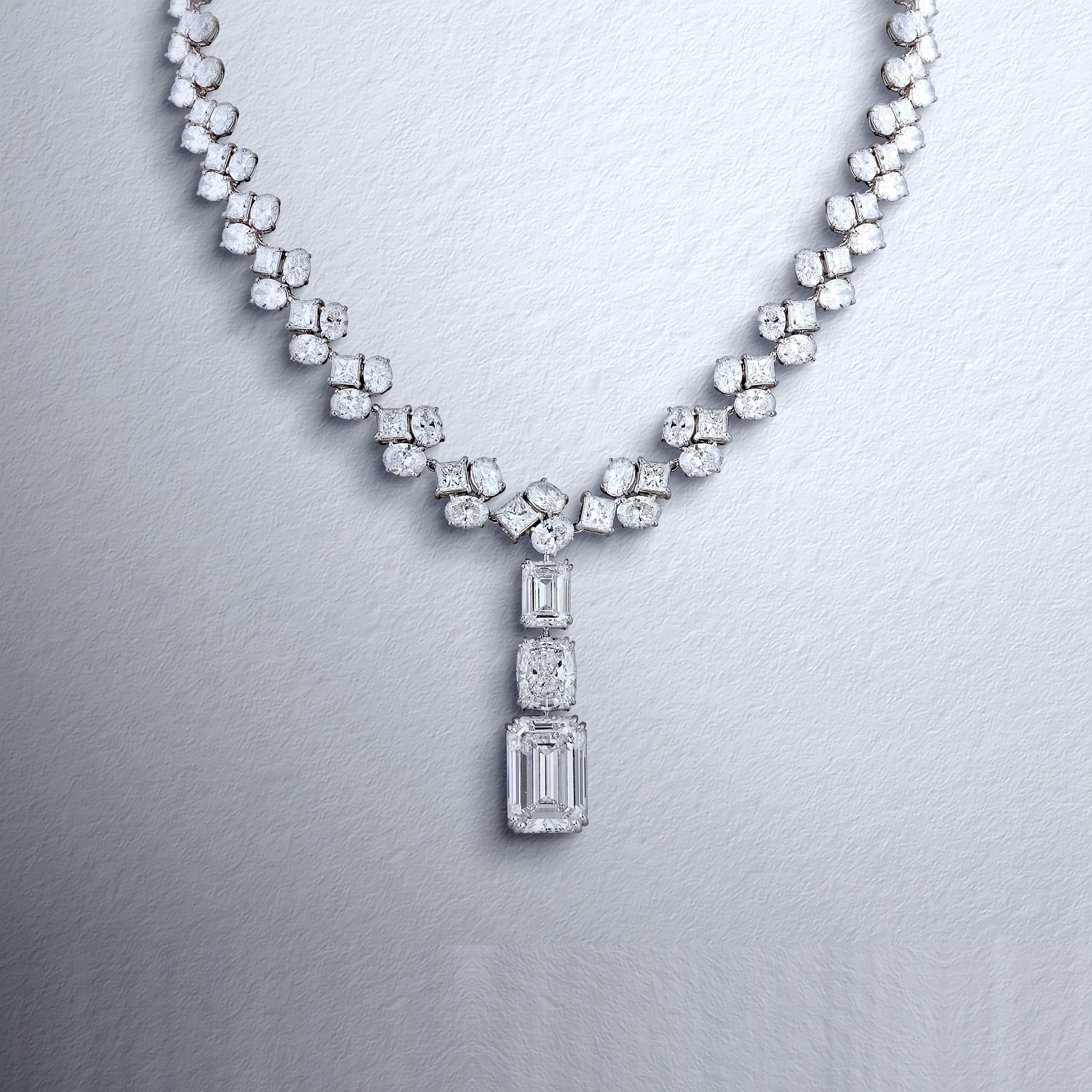 Verdant Splendor necklace with a detachable drop ending in a 16.34 carat emerald-cut diamond
